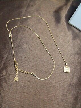 Anne Klein vintage slide necklace gold tone. Good condition.